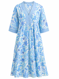 Vestido azul floral escote