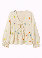 Blusa bordada con lazada