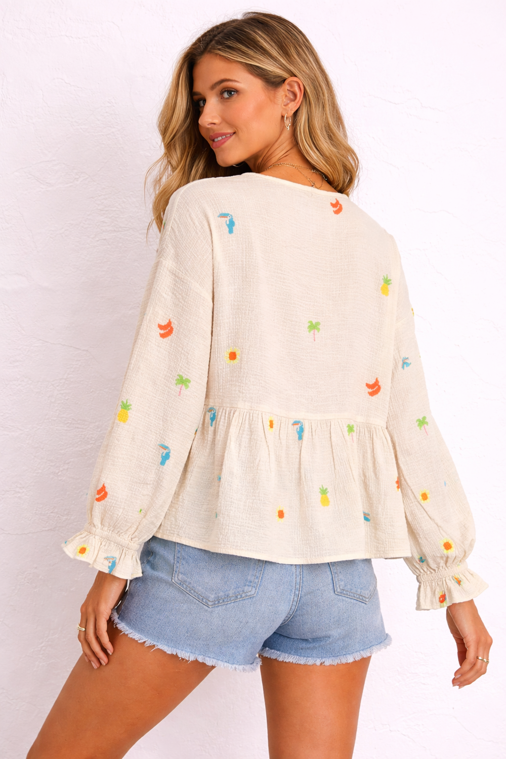 Blusa bordada con lazada