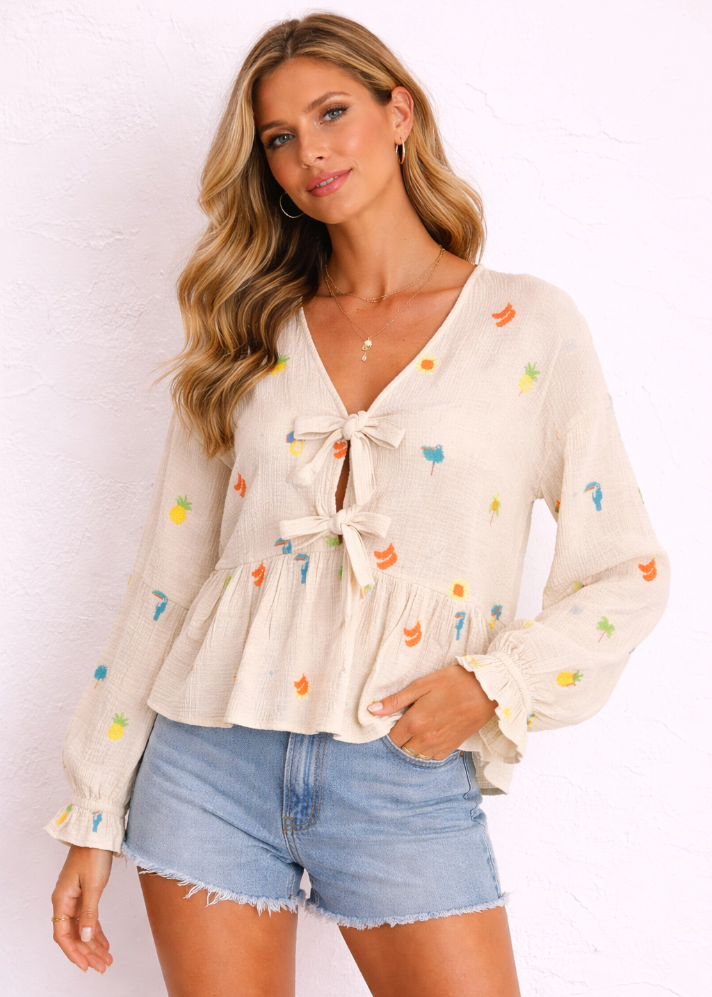 Blusa bordada con lazada