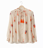 Blusa borlas beige
